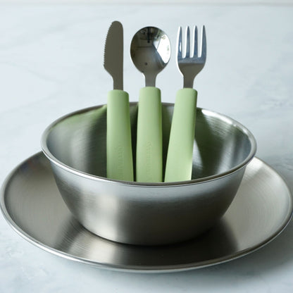 Greenvyne toddler and kids' stainless steel meal time set with plate, bowl and spoon with green silicone handle.