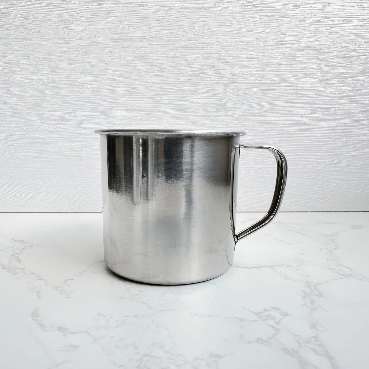 Side view of a 250ml stainless steel mug, showcasing its smooth, non-toxic interior and durable design for eco-friendly drinking.