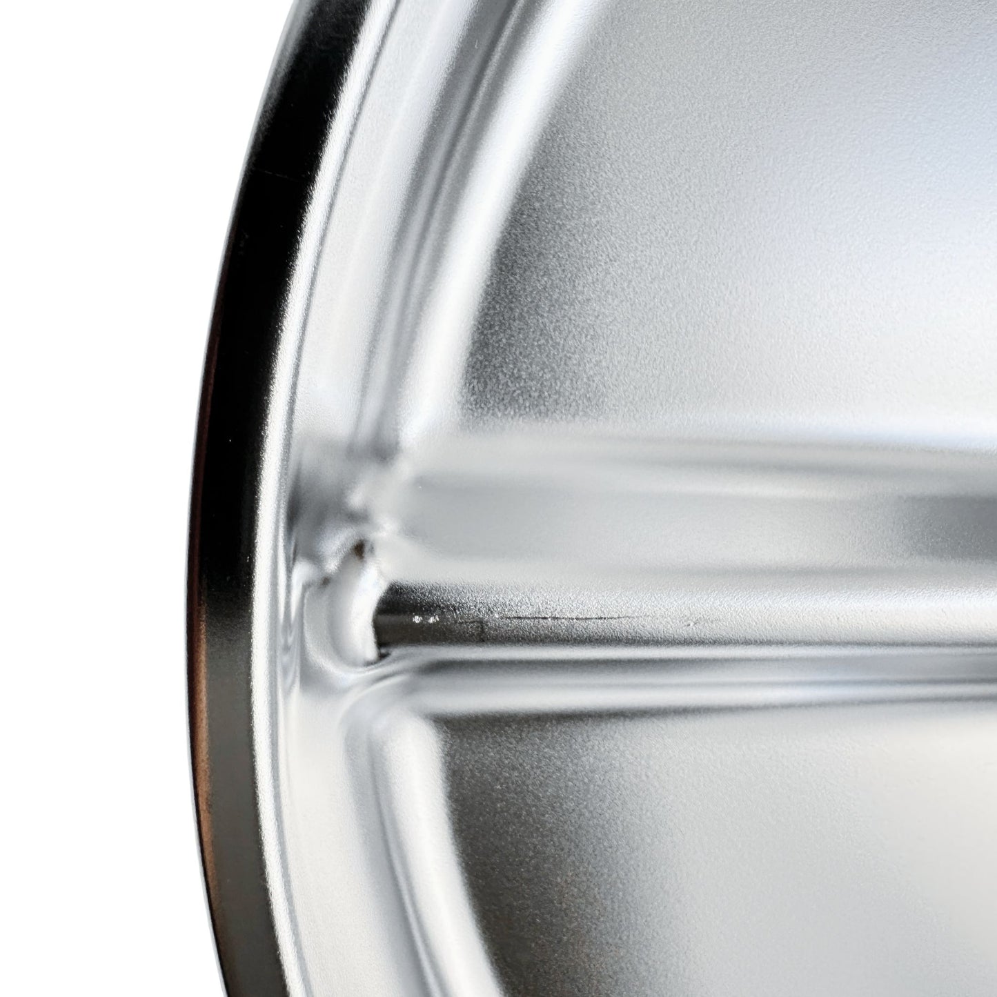  Kids stainless steel round divided plate – closeup of minor cosmetic imperfection (factory seconds).