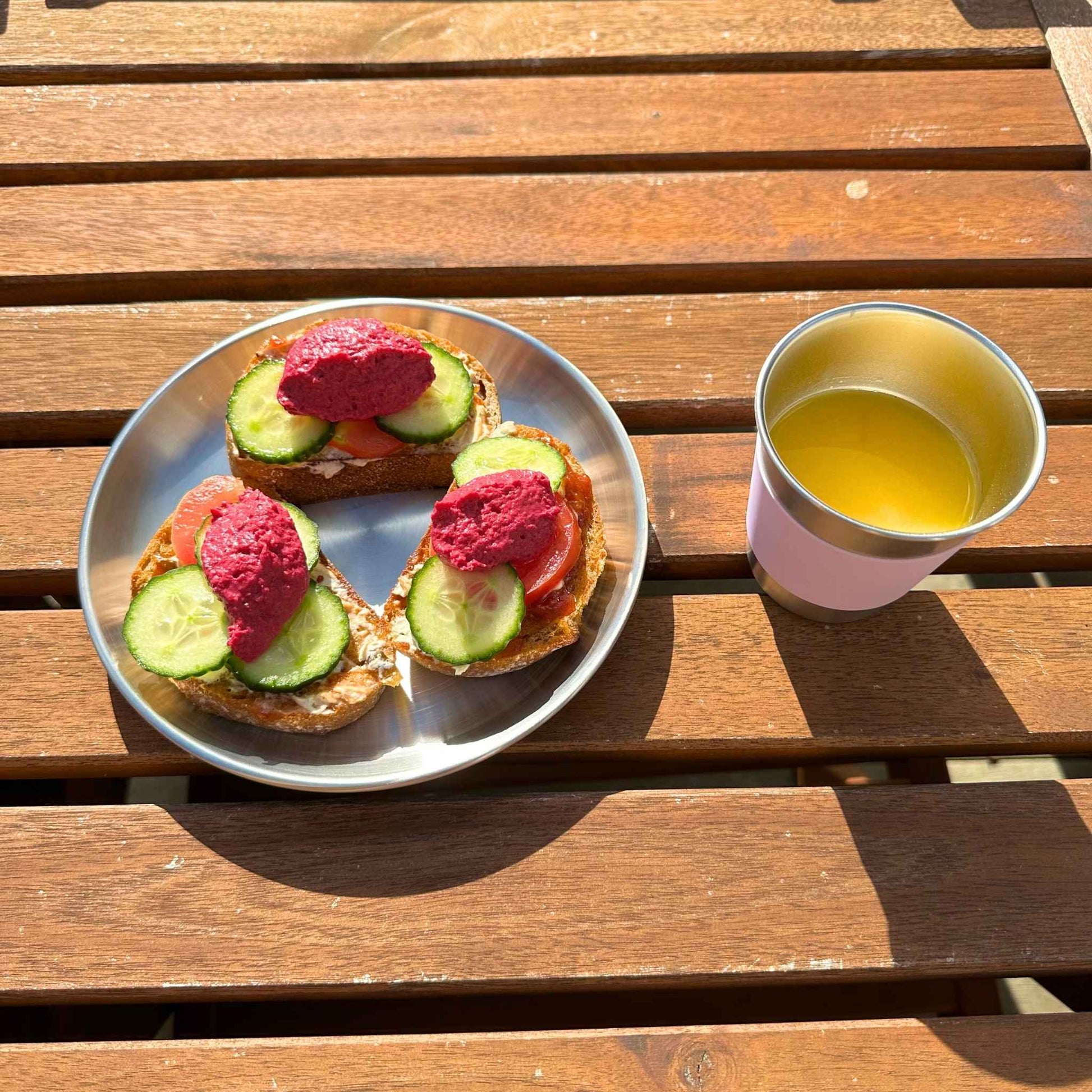 Unbreakable kids and camping stainless steel plate 20cm served with sandwich. Free from Lead, Phthalates and BPA and perfect for toddler meals and everyday serving plate.