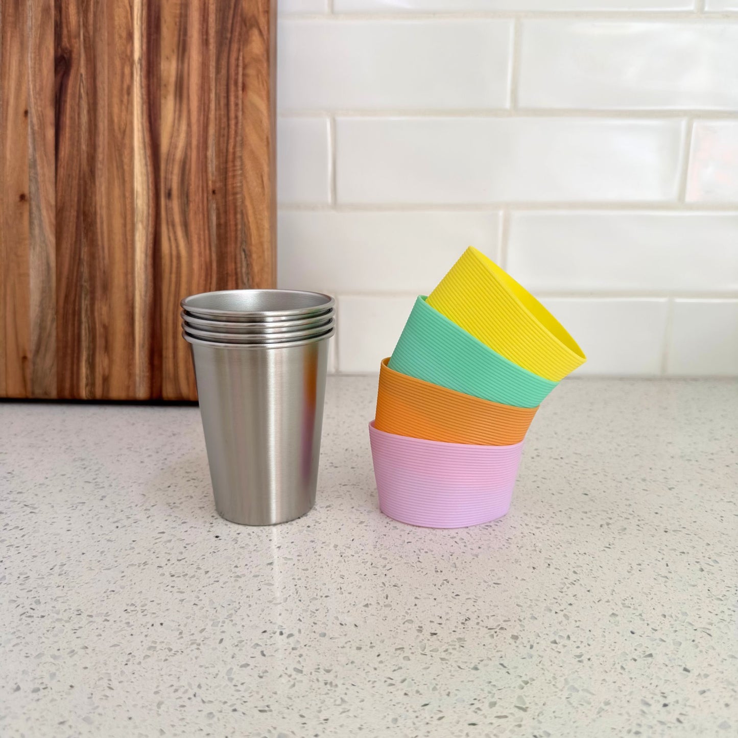 350ml stainless steel kids cups with removable non-slip FDA silicone bands in Apricot, Seafoam, Wattle and Lavender. BPA Free